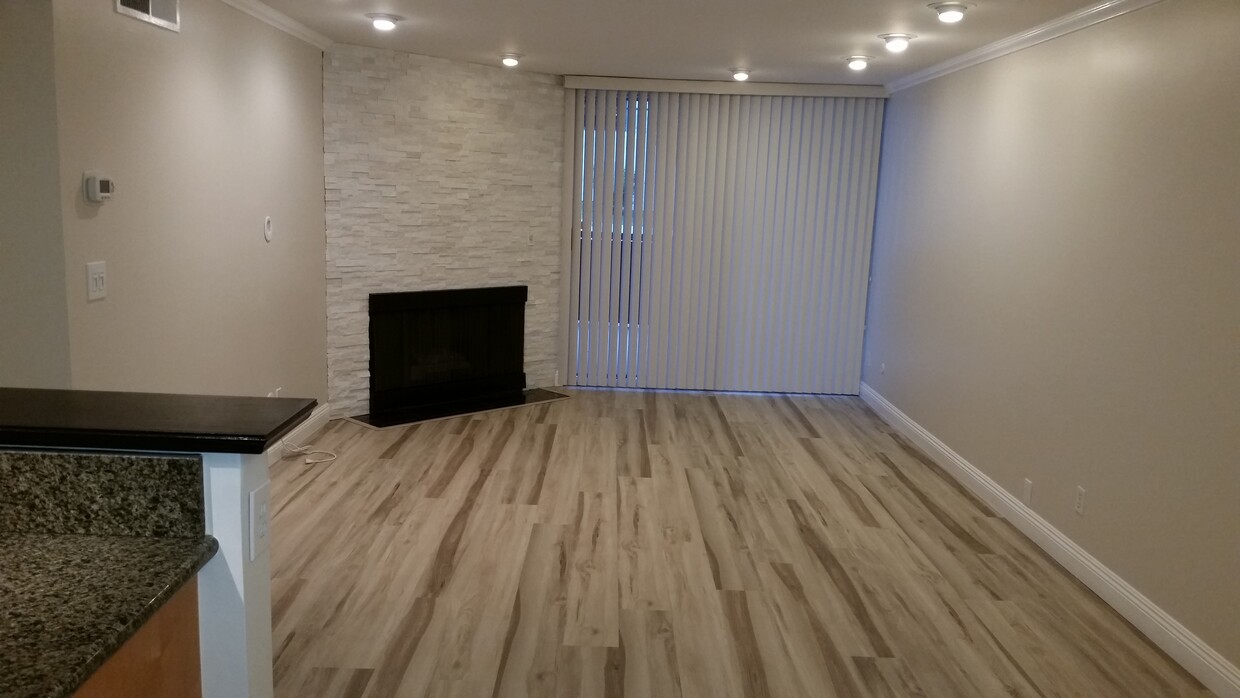 Living Room with Fireplace - 8530 Holloway Dr