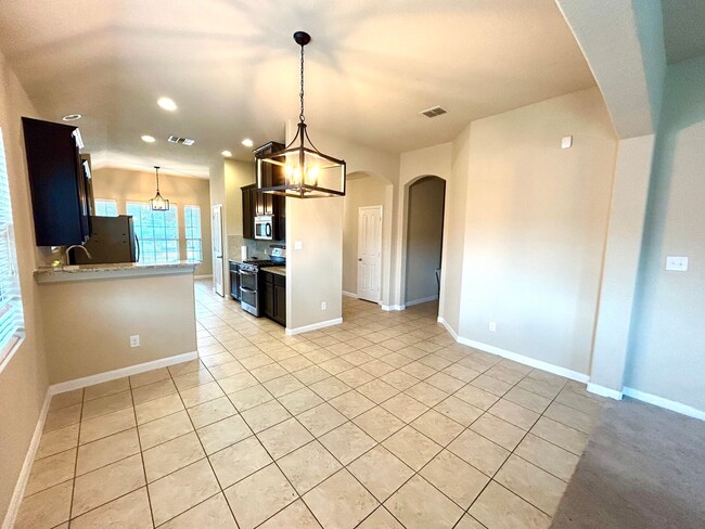 Building Photo - **APPLICATION RECEIVED** Modern Home with Fenced Backyard, Community Pool & Playground!