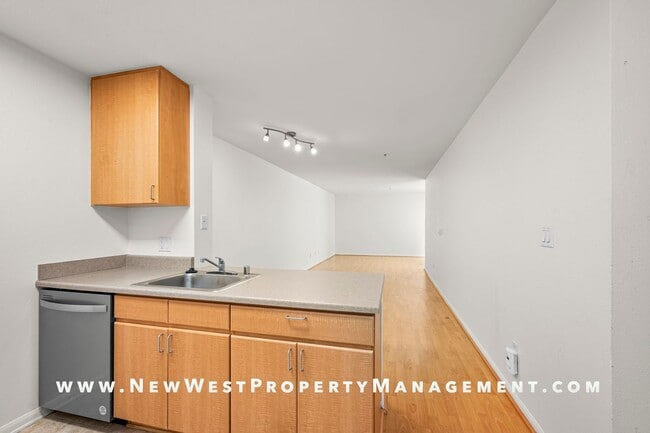 Building Photo - Charming Little Italy 1-Bedroom at Portico! Small Pet OK! Available Now!
