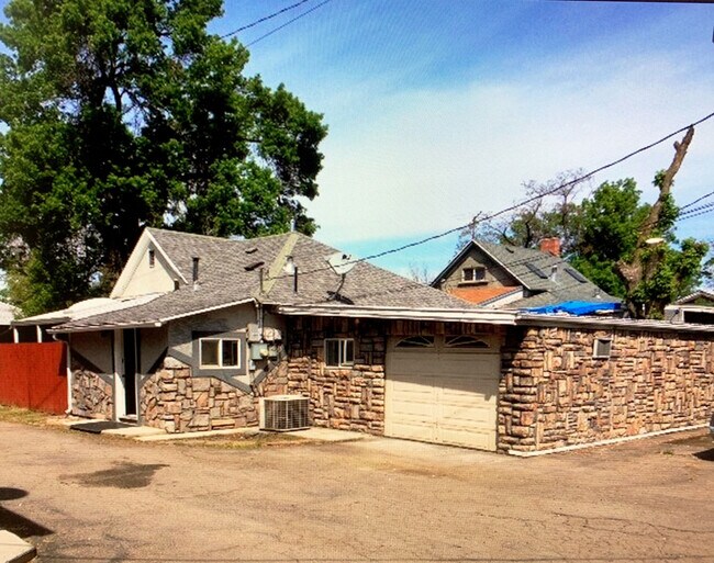 View of Back of The House and Single Car Garage and Storage. - 343 S 400 E