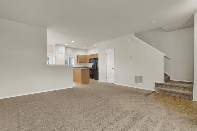 Building Photo - Updated 2-Bed Townhome Just Minutes from F...