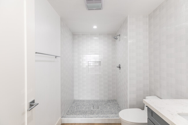 Building Photo - Experience Bright and Modern Westside Livi...
