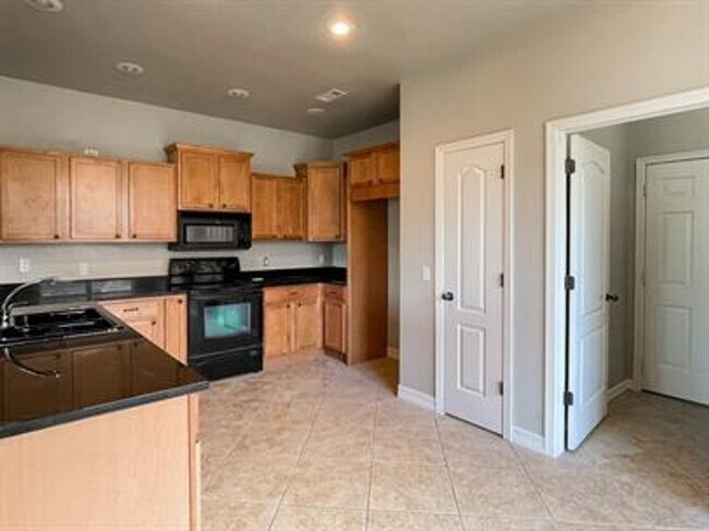 Building Photo - Come check out this centrally located, new...