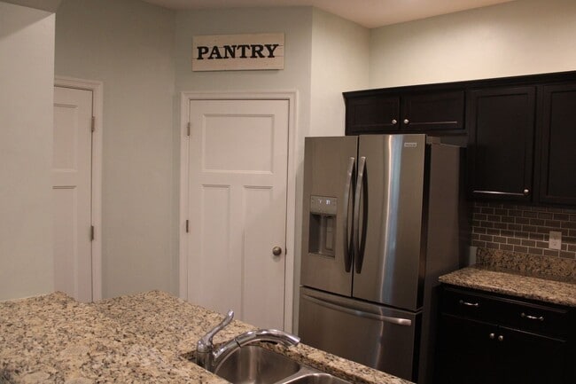Building Photo - Spectacular Townhouse!  "ASK ABOUT OUR ZER...
