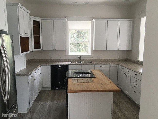Building Photo - 4 br, 3 bath House - 4456 Luke Avenue