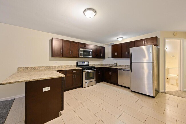 Building Photo - 4421 S Prairie Ave