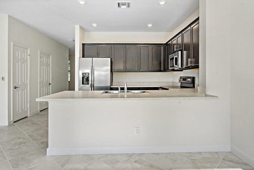 Building Photo - 6141 Bangalow Drive