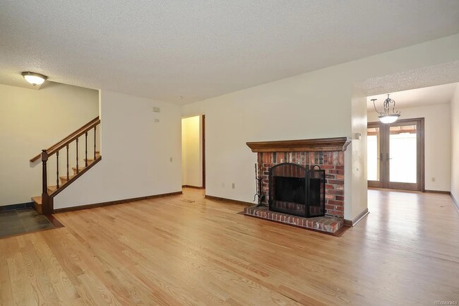 Livingroom/Fireplace - 7505 W Yale Ave