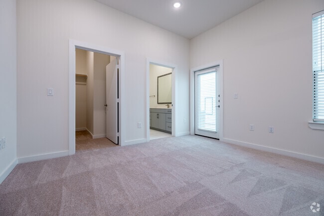 1BR, 1.5BA - 812SF - Bedroom - Oasis at Woodland