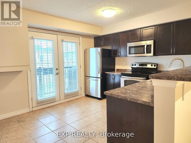 Building Photo - 1350 Main St E