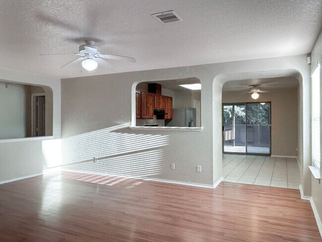 Building Photo - Northeast 3/2 with New Bedroom Floors & Covered Patio