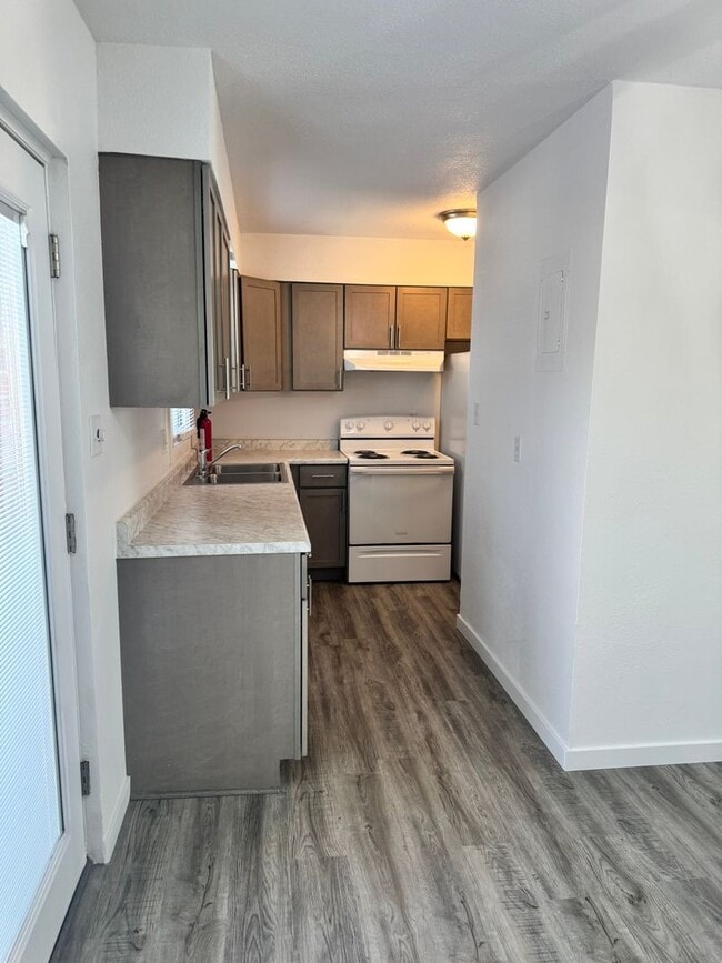 Building Photo - Renovated through out, garage included