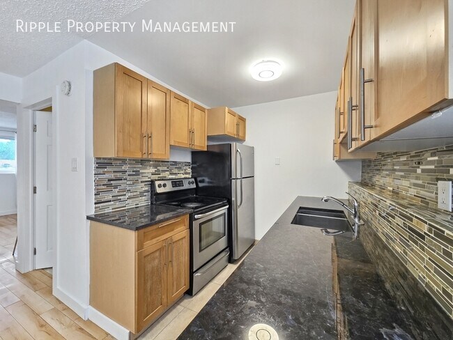 Photo du bâtiment - AMAZING 3 BEDS, 1 BATHS TOWNHOUSE | NO PETS ALLOWED