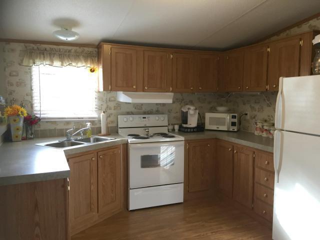 Building Photo - 2 bedroom 2 bath Mobile home East Beaurega...