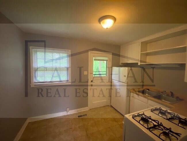 Building Photo - Park Hill 2 Bedroom Duplex