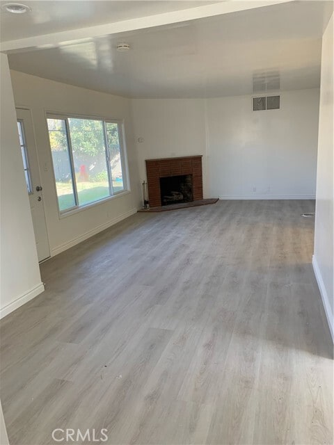 Building Photo - 9711 E Camino Real Ave