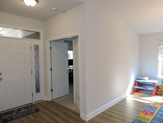 Building Photo - Almost new four bedroom home with solar pa...