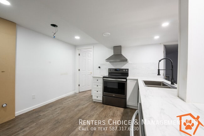 Photo du bâtiment - Pet Friendly Westside Basement Suite