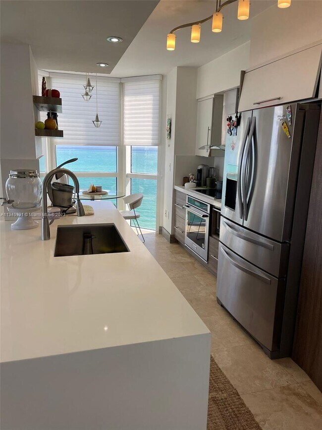 Building Photo - 6365 Collins Ave