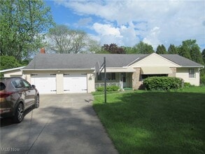 Building Photo - 6453 Poplar Dr