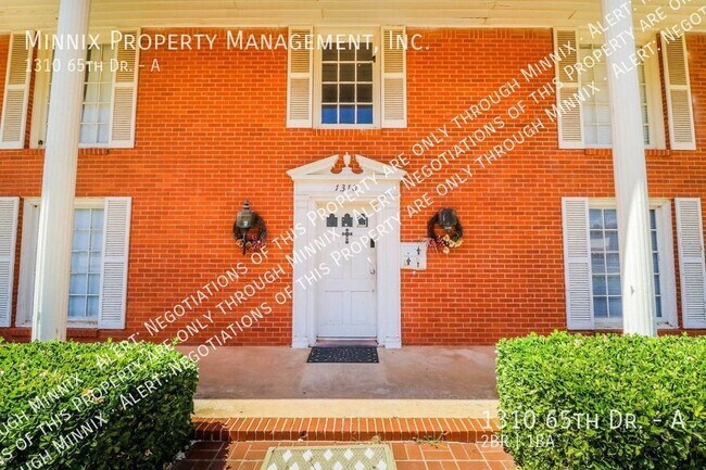 Building Photo - 1310 65th Dr. #A