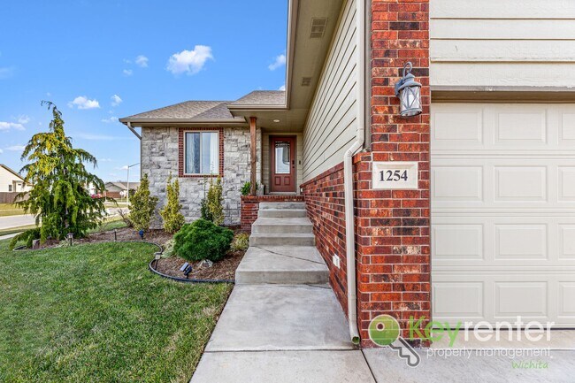 Building Photo - Spacious 4-Bedroom Home with Finished Basement & 3-Car Garage – Derby, KS