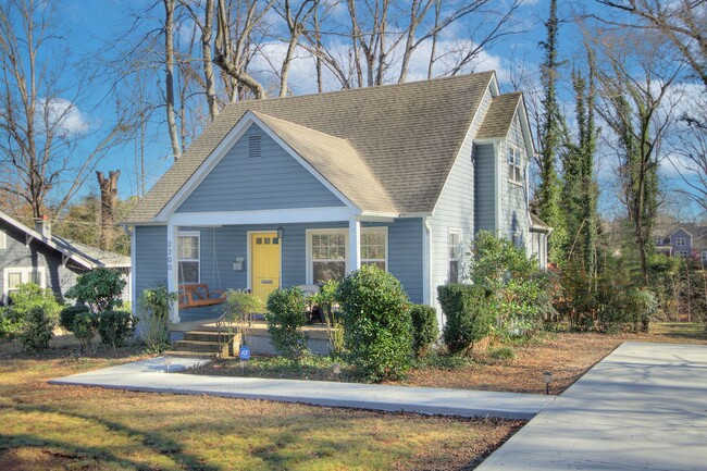 Building Photo - Step into this charming bungalow home, whe...