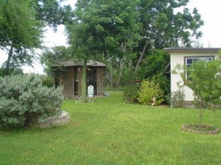Building Photo - Rose Garden Mobile Estate