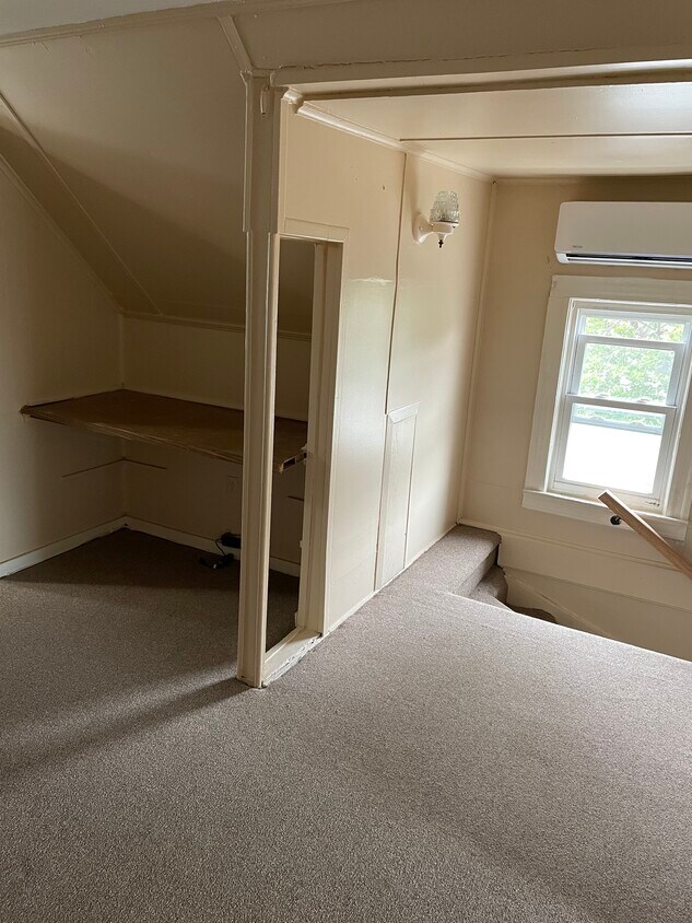 Tv shelve,stairs to exit - 472 Henry St
