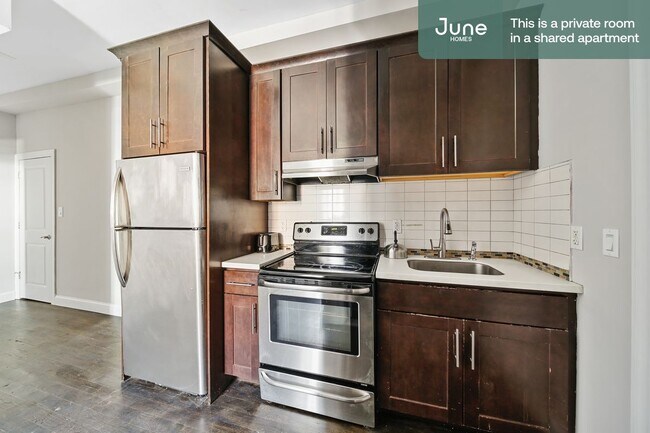 Building Photo - ROOM ONLY in 4-bed/2.0-bath Home