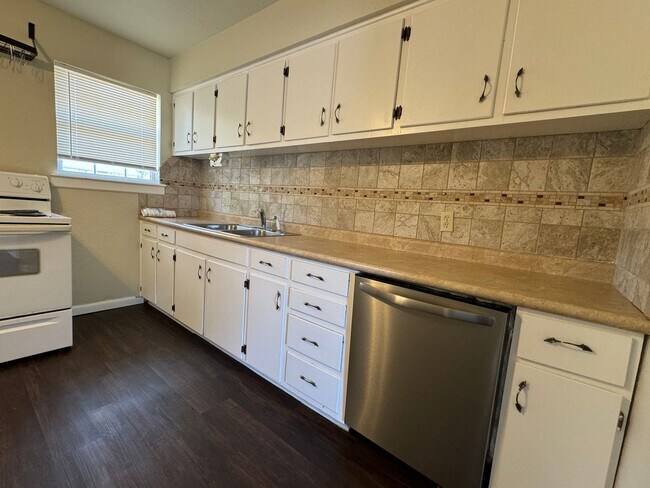 Building Photo - 5407 NW Kinyon- COMING SOON!