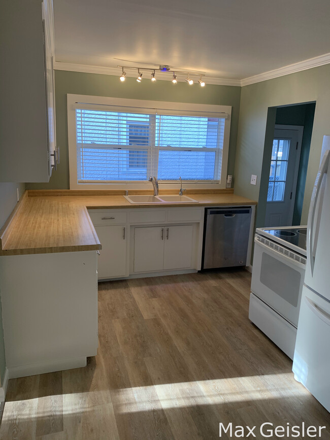 Recently updated kitchen. - 404 12th Ave N