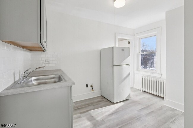 Foto del edificio - 66 N Washington Ave