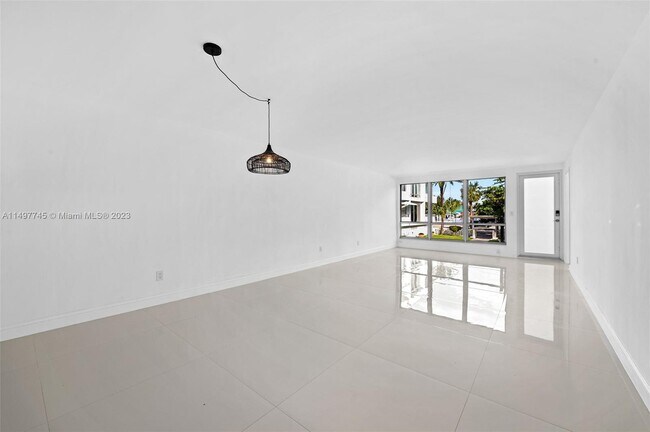 Building Photo - 10240 Collins Ave