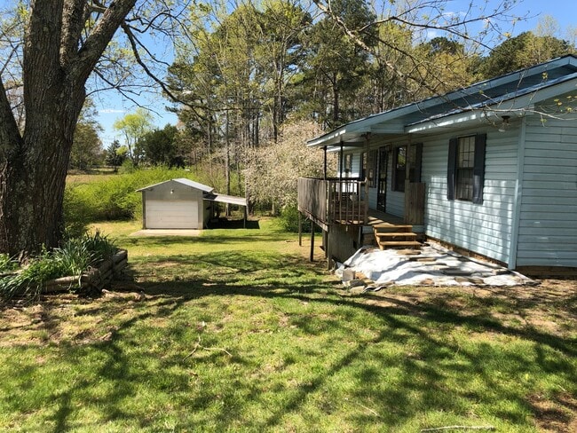 Building Photo - 4 BDR, 2 BA + Bonus Room + Garage + Huge Lot