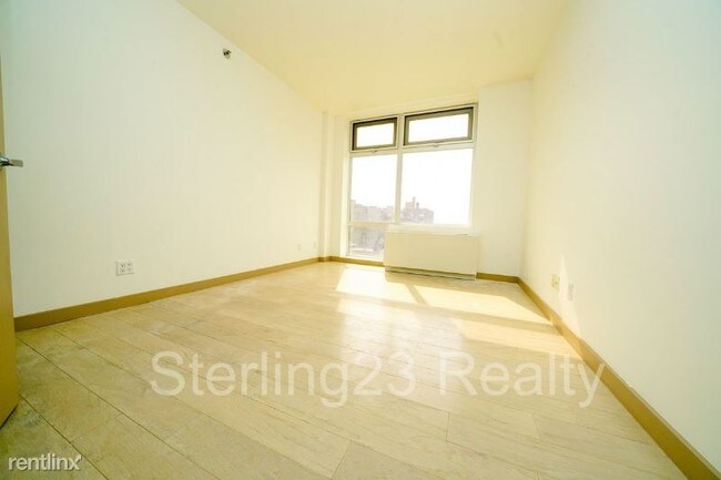 Building Photo - 40-11 73rd St