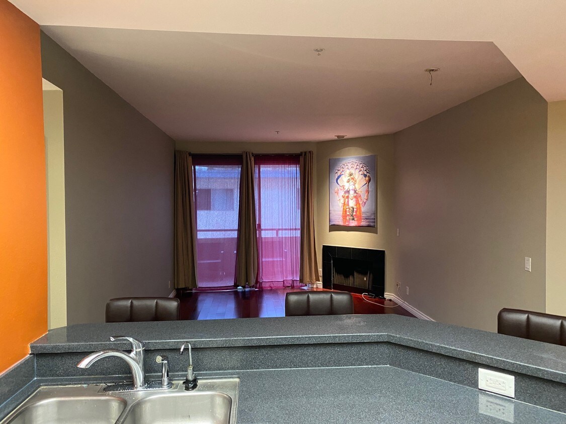 Living room with fireplace - 3561 Clarington Ave