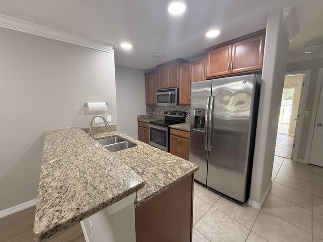 Building Photo - "Charming 3-Bed, 3-Bath Townhouse Retreat in Trinity, FL – 1501 Sq. Ft. of Comfort and Style!"