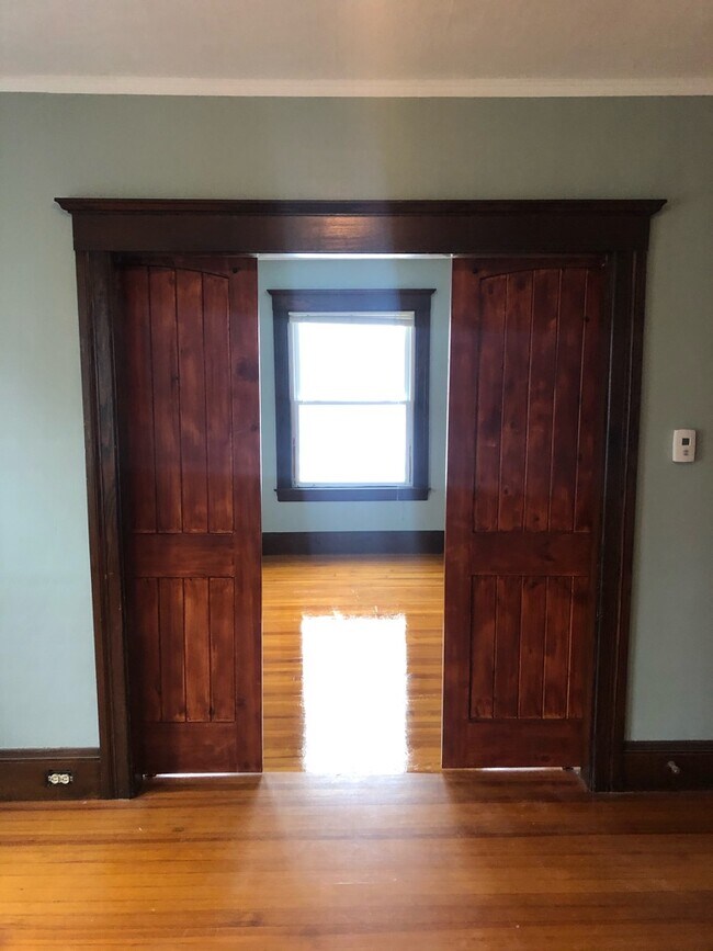 Newly installed barn doors into living space - 53 Orchard St