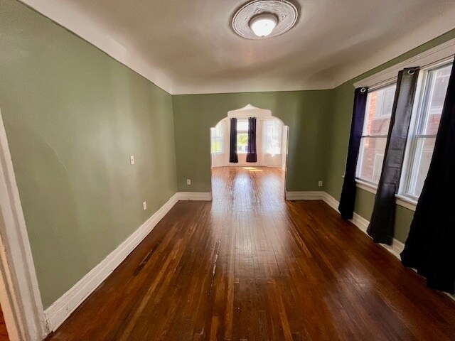 dining room into living room, hardwood throughout - 2544 Canton St