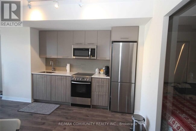 Building Photo - 1630 Queen St E