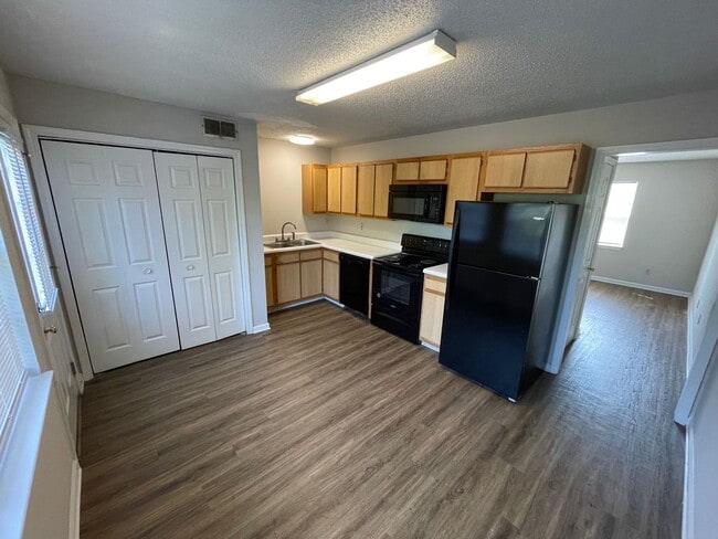 Building Photo - AVAILABLE JULY 15TH 2025! 1/2 OFF SECURITY...