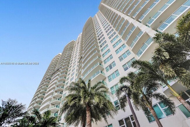 Building Photo - 20201 E Country Club Dr