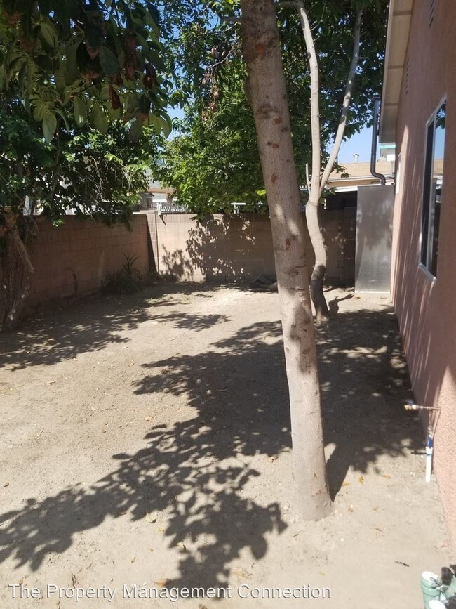 Building Photo - 4 br, 2 bath House - 12050 E 162nd Street