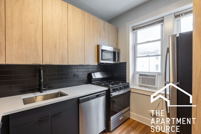 Foto del edificio - 4013 N Lowell Ave