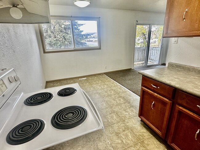 Building Photo - 10207-10207 W Pne Ave