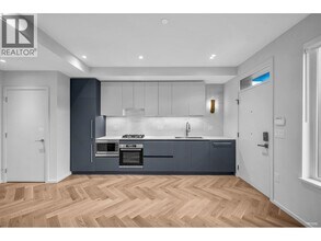 Building Photo - 775 W 49th Ave