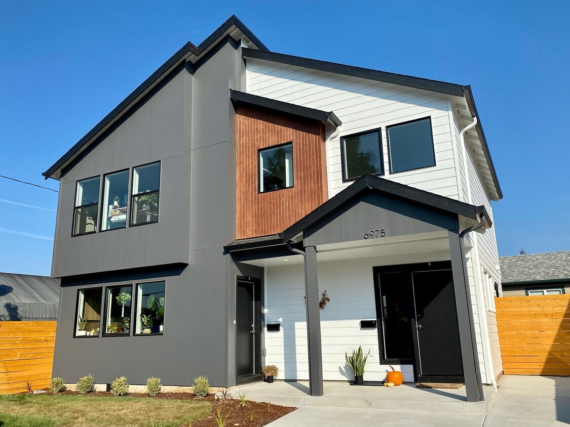 Unit on the right. The building is a two-story, side-by-side duplex so no one will be above you! - 6975 NE Multnomah St