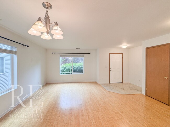 Building Photo - Spacious 4-Bedroom Home with Brand-New Carpet, Two Living Areas & Loft
