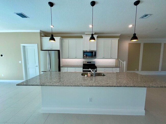 Building Photo - 3/2.5/2 Townhome in Rosette Park at Newfield